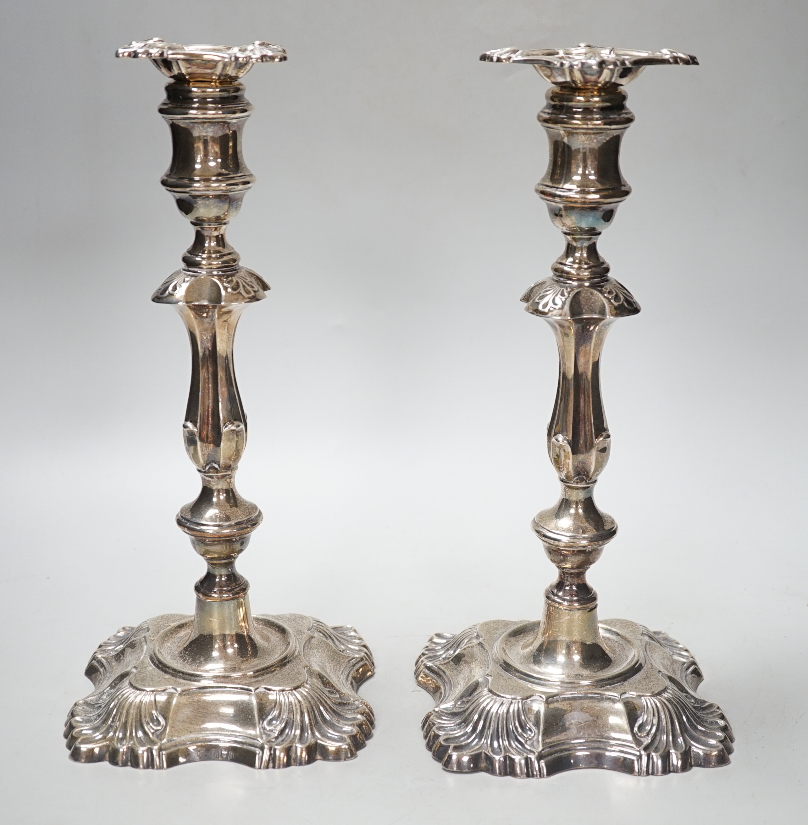 A pair of Edwardian silver candlesticks, with waisted, knopped stems, William Hutton & Sons Ltd, London, 1907, 30cm, weighted.